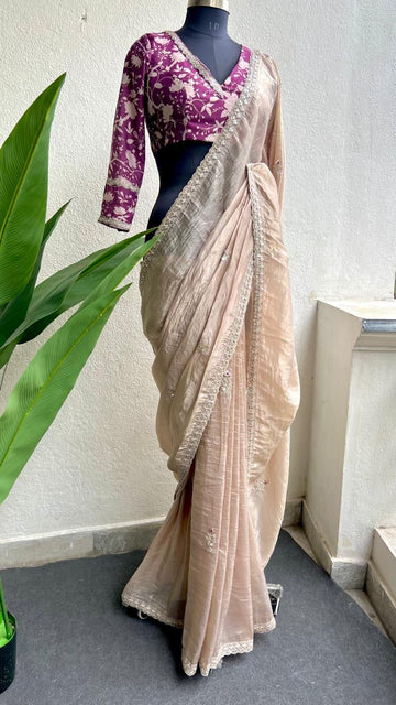 Cream soft tissue saree with wine floral embroidery blouse