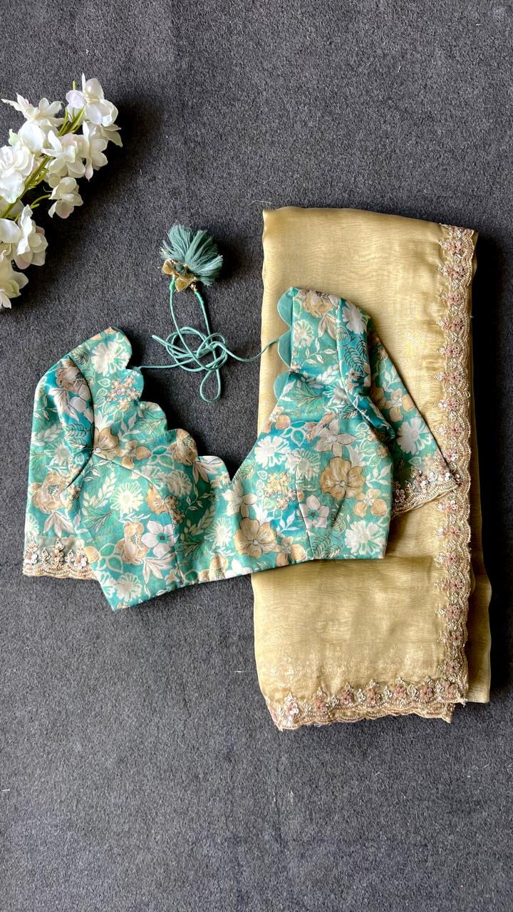 Golden soft tissue saree with blue floral embroidery blouse