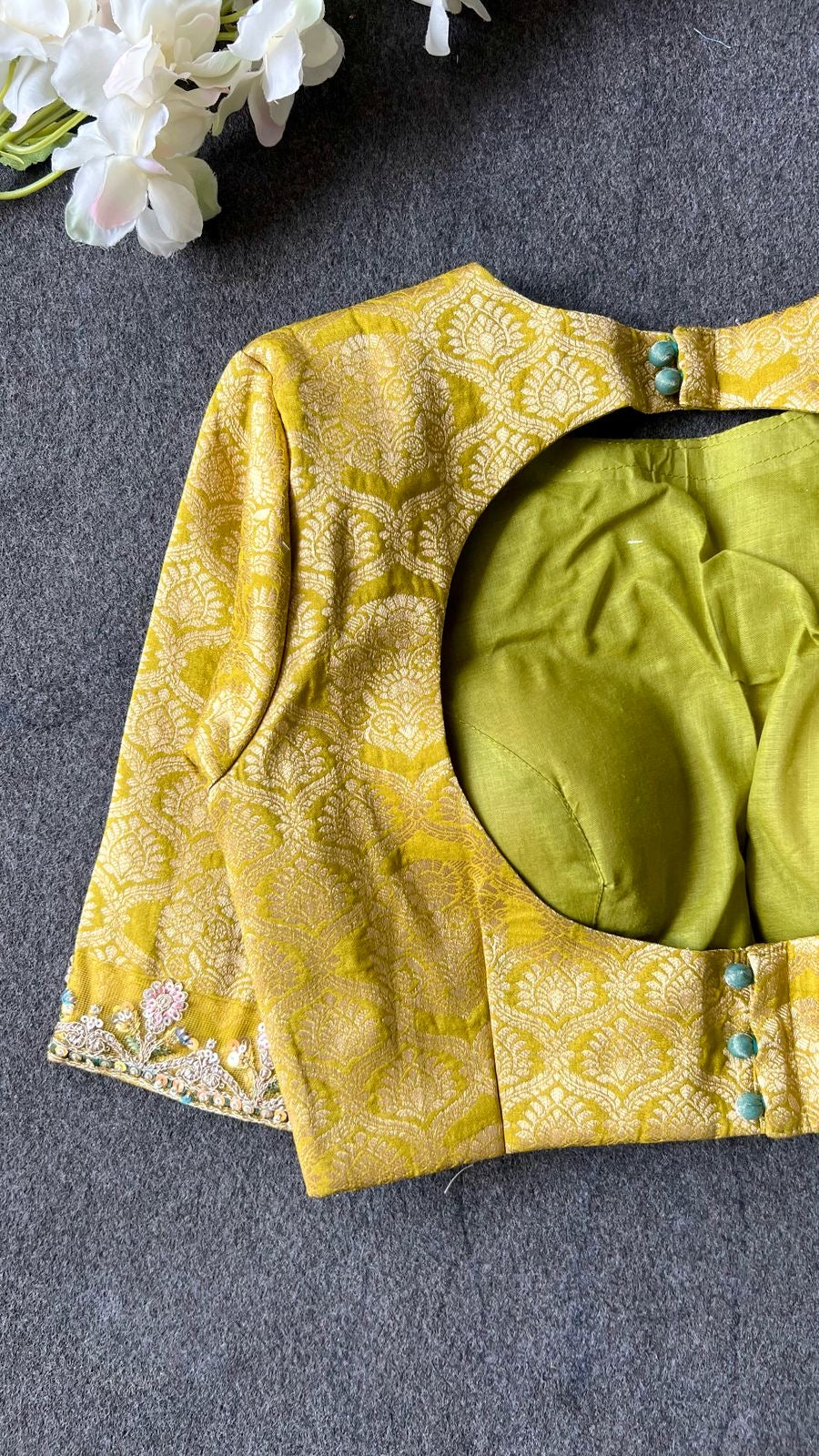 Light green soft tissue saree with golden banarasi blouse