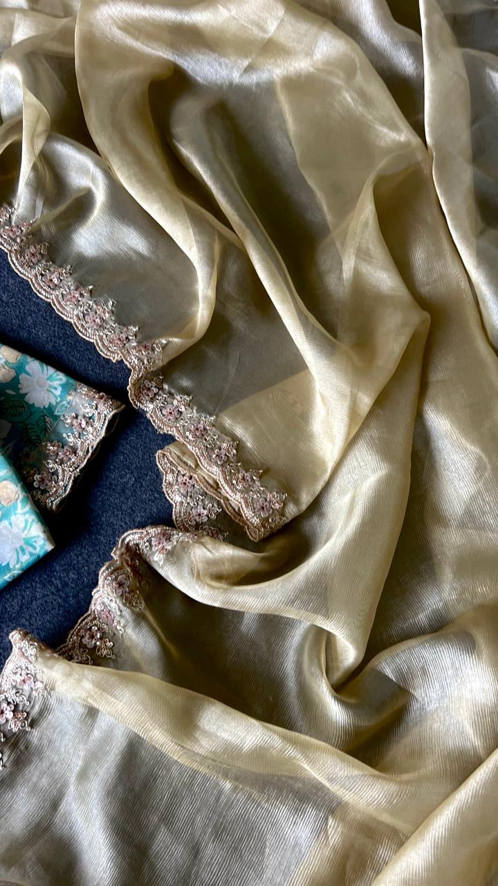 Golden soft tissue saree with blue floral embroidery blouse