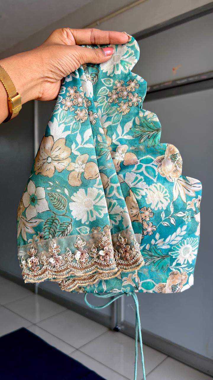 Golden soft tissue saree with blue floral embroidery blouse