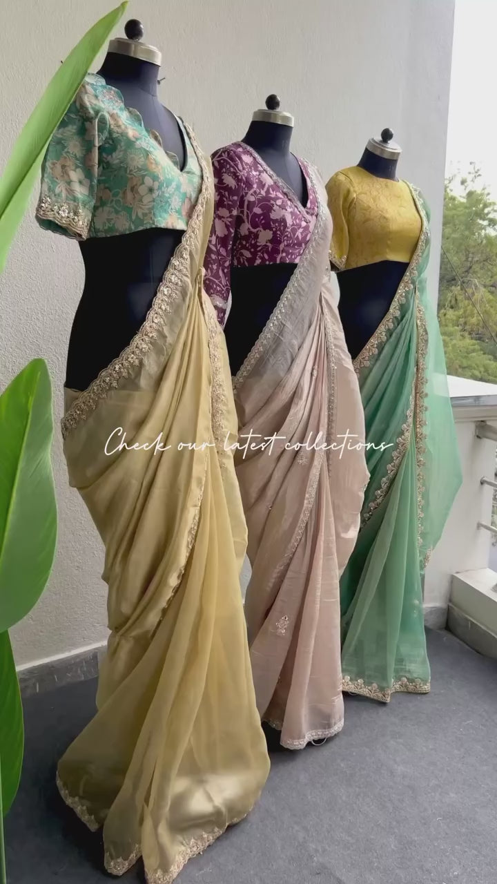Cream soft tissue saree with wine floral embroidery blouse